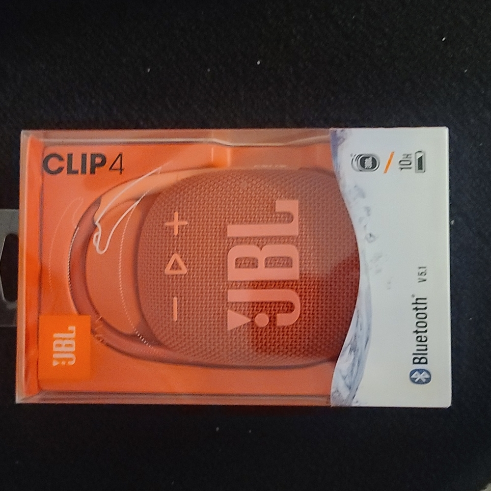 JBL clip 4 brand new, in box never opened reddish orange